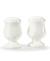 Gently scalloped detail in hardy stoneware gives the French Country salt and pepper shakers an effortless grace that's ideal for every day. From Mikasa.