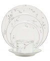 Birch branches grow around the pure white porcelain Birchwood place settings from Noritake dinnerware. The dishes of this set turn formal tables into serene landscapes. The contemporary design is refined in polished platinum with a breezy, all-natural beauty.