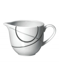 With a free-flowing circle design in shades of gray from Mikasa dinnerware, dishes like this bright white creamer add fun, contemporary appeal to any table. In ultra-durable porcelain. With a free-flowing circle design in shades of gray from Mikasa dinnerware, dishes like this bright white creamer add fun, contemporary appeal to any table. In ultra-durable porcelain.