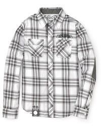 GUESS Kids' Jaspe shirt re-imagines a classic plaid work shirt with faux-suede trim and elbow patches. GUESS Kids' Jaspe shirt re-imagines a classic plaid work shirt with faux-suede trim and elbow patches.