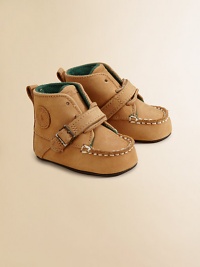 Your active little guy will love to wear this handsome high-cut style with cool contrast laces and a buckled strap across the top.Leather upper Lace-up with hook and loop strap closure Fully lined Padded insole Rubber sole Imported Additional InformationKid's Shoe Size Guide (European Equivalent) Your active little guy will love to wear this handsome high-cut style with cool contrast laces and a buckled strap across the top.Leather upper Lace-up with hook and loop strap closure Fully lined Padded insole Rubber sole Imported Additional InformationKid's Shoe Size Guide (European Equivalent)