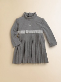 A classic design with pretty pleats and a sparkly ribbon in a turtleneck frock silhouette.TurtleneckLong sleevesBack zipperWaistband with ribbon detailPleated skirt74% viscose/20% polyester/6% elastaneDry cleanImported A classic design with pretty pleats and a sparkly ribbon in a turtleneck frock silhouette.TurtleneckLong sleevesBack zipperWaistband with ribbon detailPleated skirt74% viscose/20% polyester/6% elastaneDry cleanImported