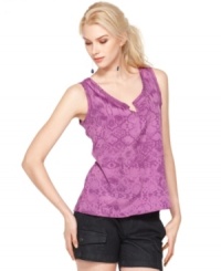 A tonal print adds a subtle shot of style to Calvin Klein Jeans' classic tank top. Delicate open stitching gives it an airy feel. A tonal print adds a subtle shot of style to Calvin Klein Jeans' classic tank top. Delicate open stitching gives it an airy feel.