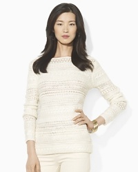 Knit in plush yarns for texture, this wool-blend sweater is a stylish warm-weather essential. Knit in plush yarns for texture, this wool-blend sweater is a stylish warm-weather essential.