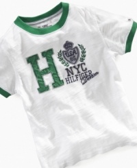 With the fresh green detailing on this tee from Tommy Hilfiger, he can put his sharp style back in play. With the fresh green detailing on this tee from Tommy Hilfiger, he can put his sharp style back in play.
