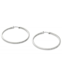Go full-blitz with these glitzy hoop earrings from Fossil. The classic design is amped up with clear pave crystal accents. Crafted in polished stainless steel. Approximate diameter: 2 inches.