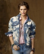 Capturing a spirit of adventure inspired by years on the open road, a distressed and abraded denim jacket is finished with a unique bleach-out pattern for a modern twist on a well-worn favorite from Denim & Supply Ralph Lauren.