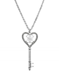 GUESS has the key to your heart with this pendant necklace. Crafted from silver-tone mixed metal with glistening glass crystal stones for a lustrous touch. Approximate length: 28 inches + 2-inch extender. Approximate drop: 3 inches. GUESS has the key to your heart with this pendant necklace. Crafted from silver-tone mixed metal with glistening glass crystal stones for a lustrous touch. Approximate length: 28 inches + 2-inch extender. Approximate drop: 3 inches.