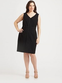 An invigorating, sleeveless design with remarkable piping details that flatters the figure for an enviable silhouette.V-necklineSleevelessConcealed front zipperFully linedAbout 26 from natural waist84% polyester/16% polyurethaneDry cleanImported An invigorating, sleeveless design with remarkable piping details that flatters the figure for an enviable silhouette.V-necklineSleevelessConcealed front zipperFully linedAbout 26 from natural waist84% polyester/16% polyurethaneDry cleanImported