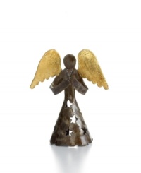 It takes two days to create – one to hammer and shape the steel, plus another to apply the foil and finish – but this beautiful angel figurine will radiate joy for years to come. Handmade in metal salvaged from empty oil drums by Croix-des-Bouquets artisans. It takes two days to create – one to hammer and shape the steel, plus another to apply the foil and finish – but this beautiful angel figurine will radiate joy for years to come. Handmade in metal salvaged from empty oil drums by Croix-des-Bouquets artisans.