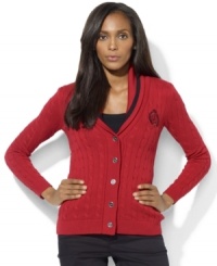 Heritage style abounds in Lauren Ralph Lauren's shawl-collar cardigan, constructed in a classic cable-knit pattern with signature engraved buttons and a Lauren Ralph Lauren crest. Heritage style abounds in Lauren Ralph Lauren's shawl-collar cardigan, constructed in a classic cable-knit pattern with signature engraved buttons and a Lauren Ralph Lauren crest.