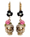 Cuteness to die for, Betsey Johnson does it again. Crystal skulls with heart-shaped eyes and pink flower accents hang from black enamel flowers. Earrings crafted from antique gold-plated mixed metal. Approximate drop: 1-1/2 inches.