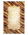 A polka dot pattern against a subtle creme background creates an abstract rug of rich, artistic beauty. A vivid, swirling border in a color palette that includes burgundy, lavender and beige completes the rug with a resplendent finish. Hand-tufted and hand-carved of plush wool.