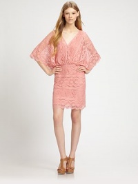Gorgeous floral lace- this season's must-have trend- skims the body in a comely blouson silhouette with full bell sleevesSurplice necklineDropped shouldersThree-quarter bell sleevesSet-in waistFitted skirtAbout 36 from shoulder to hem57% cotton/43% nylonHand washImportedModel shown is 5'10 (177cm) wearing US size Small. Gorgeous floral lace- this season's must-have trend- skims the body in a comely blouson silhouette with full bell sleevesSurplice necklineDropped shouldersThree-quarter bell sleevesSet-in waistFitted skirtAbout 36 from shoulder to hem57% cotton/43% nylonHand washImportedModel shown is 5'10 (177cm) wearing US size Small.