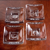 Contemporary shapes and distinct carvings for each day of the week make these accent dishes a wonderful addition to any festive gathering. Contemporary shapes and distinct carvings for each day of the week make these accent dishes a wonderful addition to any festive gathering.