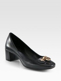 Gleaming logo hardware tops this simple leather pump with a block heel. Self-covered heel, 2 (50mm)Leather upperLeather lining and solePadded insoleImported Gleaming logo hardware tops this simple leather pump with a block heel. Self-covered heel, 2 (50mm)Leather upperLeather lining and solePadded insoleImported