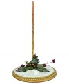 Put your Mark Roberts figurine on a pedestal of shimming snow and gold. A bit of Christmas foliage adds to the festive display.