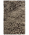 Survival of the prettiest. An exotic print adorns Nourison's Skyland rug in bold, contrasting black and ivory hues, bringing a wildly chic look to any space. The plush wool rug is enhanced with meticulous hand carving for beautiful detail and texture. (Clearance)