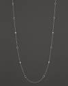 White sapphire stations shine on a sterling silver chain. From Judith Ripka.