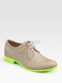 A lace-up leather must-have with a contrasting sole and slight heel. Stacked heel, 1 (25mm)Leather upperLeather lining and solePadded insoleMade in Italy A lace-up leather must-have with a contrasting sole and slight heel. Stacked heel, 1 (25mm)Leather upperLeather lining and solePadded insoleMade in Italy