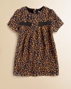 Grown-up tailoring distinguishes a fine frock in a splotchy woven print with front pleating and a subtly flared shape.Round necklineShort sleevesFront yoke with solid insetsDiagonal front pleatsEmbroidered logo at hemBack yokeHidden back zip closeFully linedPolyesterMachine washMade in France