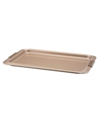 A cookie sheet that knows when to let go, this piece of bakeware is an essential for hassle-free cooking with a strong carbon steel core coated in a durable bronze nonstick finish that provides quick and effortless food release and fast cleaning. Designed with wide rimming along the edge, this cookie sheet is easy to maneuver and handle even with bulky oven mitts. Limited lifetime warranty. A cookie sheet that knows when to let go, this piece of bakeware is an essential for hassle-free cooking with a strong carbon steel core coated in a durable bronze nonstick finish that provides quick and effortless food release and fast cleaning. Designed with wide rimming along the edge, this cookie sheet is easy to maneuver and handle even with bulky oven mitts. Limited lifetime warranty.