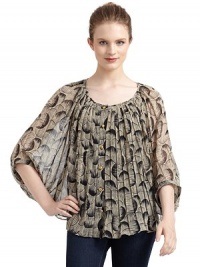 THE LOOKScoopneckAbstract circle pattern on pleated chiffonBatwing sleevesFront button placketIncludes adjustable camisoleTHE FITAbout 21 from shoulder to hemTHE MATERIALBlouse and camisole: polyesterCARE & ORIGINDry cleanImportedModel shown is 5'11 (180cm) wearing US size Small.This item was originally available for purchase at Saks Fifth Avenue OFF 5TH stores. THE LOOKScoopneckAbstract circle pattern on pleated chiffonBatwing sleevesFront button placketIncludes adjustable camisoleTHE FITAbout 21 from shoulder to hemTHE MATERIALBlouse and camisole: polyesterCARE & ORIGINDry cleanImportedModel shown is 5'11 (180cm) wearing US size Small.This item was originally available for purchase at Saks Fifth Avenue OFF 5TH stores.