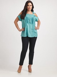 Show a little skin with this unique take on the classic peasant top. This cold-shoulder design features lovely eyelet and self-tie details. Square neckCold shouldersSelf-tiesEyelet and embroidered details at centerAbout 30 from shoulder to hemCottonMachine washImported Show a little skin with this unique take on the classic peasant top. This cold-shoulder design features lovely eyelet and self-tie details. Square neckCold shouldersSelf-tiesEyelet and embroidered details at centerAbout 30 from shoulder to hemCottonMachine washImported