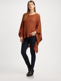 Long poncho sleeves and an emphasized hi-lo hem update this soft, woven boatneck sweater. BoatneckDropped shouldersLong poncho sleeves85% acrylic/15% nylonHand washImportedAdditional Information Women's Premier Designer & Contemporary Size Guide Long poncho sleeves and an emphasized hi-lo hem update this soft, woven boatneck sweater. BoatneckDropped shouldersLong poncho sleeves85% acrylic/15% nylonHand washImportedAdditional Information Women's Premier Designer & Contemporary Size Guide