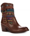 Ethnic fabric on the upper of Lucky Brand's Boxer booties provides the perfect complement to the smooth, shiny leather and metal ring and buckle detailing.
