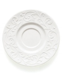 An elegant white-on-white pattern featuring an embossed vine motif and interior glaze lends the Opal Innocence Carved saucer to refined dining every day.