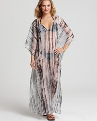 Make exotic glamour your poolside signature with this printed kaftan. An alluring ikat print adds drama, while a gauzy silhouette is cool no matter the temperature.