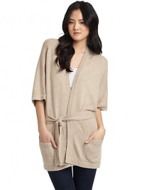 THE LOOKV-neckElbow-length dolman sleevesSelf-tie waistDual patch pocketsCenter back seamTHE FITAbout 27 from shoulder to hemTHE MATERIALRayon/nylon/cotton/wool/angora/cashmereCARE & ORIGINDry cleanImportedModel shown is 5'10 (177cm) wearing US size Small. THE LOOKV-neckElbow-length dolman sleevesSelf-tie waistDual patch pocketsCenter back seamTHE FITAbout 27 from shoulder to hemTHE MATERIALRayon/nylon/cotton/wool/angora/cashmereCARE & ORIGINDry cleanImportedModel shown is 5'10 (177cm) wearing US size Small.