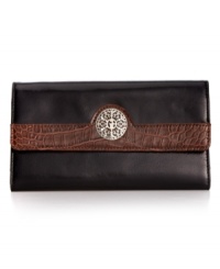 Upgrade your accessories arsenal with this clutch design from Giani Bernini. Gorgeous, glazed leather and vintage-inspired details add instant appeal, while the exquisitely organized interior boasts room for all your essentials, and more. Upgrade your accessories arsenal with this clutch design from Giani Bernini. Gorgeous, glazed leather and vintage-inspired details add instant appeal, while the exquisitely organized interior boasts room for all your essentials, and more.