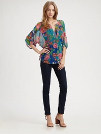 Gorgeous florals highlight crinkled silk chiffon in this easy split-neck top.Band collarSplit V necklineGathered sleevesShirttail hemAbout 26 from shoulder to hemSilkDry cleanImportedModel shown is 5'9 (175cm) wearing US size Small. Gorgeous florals highlight crinkled silk chiffon in this easy split-neck top.Band collarSplit V necklineGathered sleevesShirttail hemAbout 26 from shoulder to hemSilkDry cleanImportedModel shown is 5'9 (175cm) wearing US size Small.