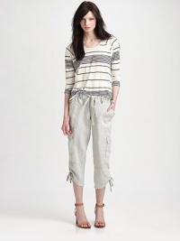 Featherweight linen in a slouchy cargo silhouette cropped just below the knee.Drawstring waistFly frontSide patch pocketsFlap cargo pocketsBack flap pocketsInseam, about 21Rise, about 8LinenMachine washImportedModel shown is 5'10 (177cm) wearing US size 4. Featherweight linen in a slouchy cargo silhouette cropped just below the knee.Drawstring waistFly frontSide patch pocketsFlap cargo pocketsBack flap pocketsInseam, about 21Rise, about 8LinenMachine washImportedModel shown is 5'10 (177cm) wearing US size 4.