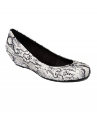 Snake charming. A fierce python print takes Rocket Dog's Tonic wedges from casual to cool. Snake charming. A fierce python print takes Rocket Dog's Tonic wedges from casual to cool.