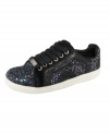 Dark sparkles makes casual sneakers not-so-casual at all. Juicy Couture's Darien sneakers are made of black suede leather and chunky glitter. A great combo that's both sparkly and sporty.