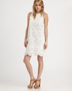 Delicate cotton eyelet in a lightweight sleeveless shift.BoatneckSleevelessFlat frontScalloped hemCenter back zipperAbout 18 from natural waistCottonDry cleanImportedModel shown is 5'11 (180cm) wearing US size Small.