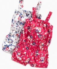 A blooming beauty. Smiles will blossom all-around when she's in this darling floral romper from Guess. A blooming beauty. Smiles will blossom all-around when she's in this darling floral romper from Guess.