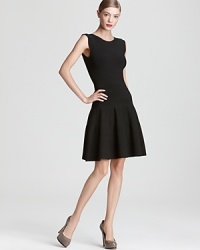 Minimalist, structural and striking, this Issa London knit dress masters pitch-perfect LBD style.