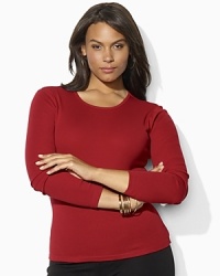 Crafted with a sleek crew neckline and long sleeves, a light-as-air cotton tee is essential both for layering and wear-alone style. Crafted with a sleek crew neckline and long sleeves, a light-as-air cotton tee is essential both for layering and wear-alone style.