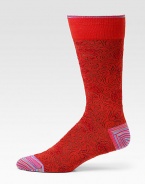 Socks featuring a subtle print perfectly complemented by a striped heel and toe.Mid-calf height70% pima cotton/29% nylon/1% Lycra®Machine washImported
