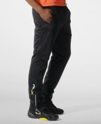 Designed for high-level comfort and superior performance, an athletic track pant is crafted in sleek stretch microfiber with hydro-mesh panels and reflective graphics. Designed for high-level comfort and superior performance, an athletic track pant is crafted in sleek stretch microfiber with hydro-mesh panels and reflective graphics.