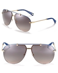 Chic rimless aviator sunglasses get a pop of color along top bar and arms for eye-catching style. Chic rimless aviator sunglasses get a pop of color along top bar and arms for eye-catching style.