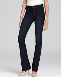 A flattering dark wash denim jean for a curvy, bootcut fit with a slim, slightly-flared leg. A flattering dark wash denim jean for a curvy, bootcut fit with a slim, slightly-flared leg.