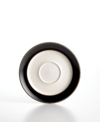 More than meets the eye, Denby's Praline Noir saucer boasts standout durability in addition to style. With a distinct silhouette in casual stoneware and black and white glaze. More than meets the eye, Denby's Praline Noir saucer boasts standout durability in addition to style. With a distinct silhouette in casual stoneware and black and white glaze.
