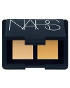 Since the skin on your face is not created equal, one shade of concealer usually won't suffice. The new NARS Duo Concealer palette features two complementary shades--there are three available color combinations to suit an array of complexions that can be blended together or used individually.