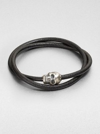 Silver skull accent joins together a double strand of smooth, genuine leather.LeatherSterling silverAbout 2½ diam.Made in the United Kingdom