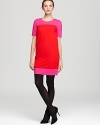 Go from color blocking to color shocking as searing shades take a classic kate spade new york shift dress to new heights of chic. Accentuate the bold palette with sheer black tights.